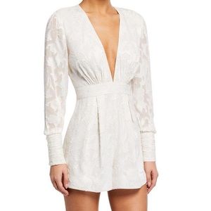 Never worn with tags Alexis white romper